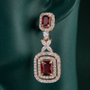 Zelra Rose Gold AD Ruby Red Double Halo Drop Earrings (P-5)