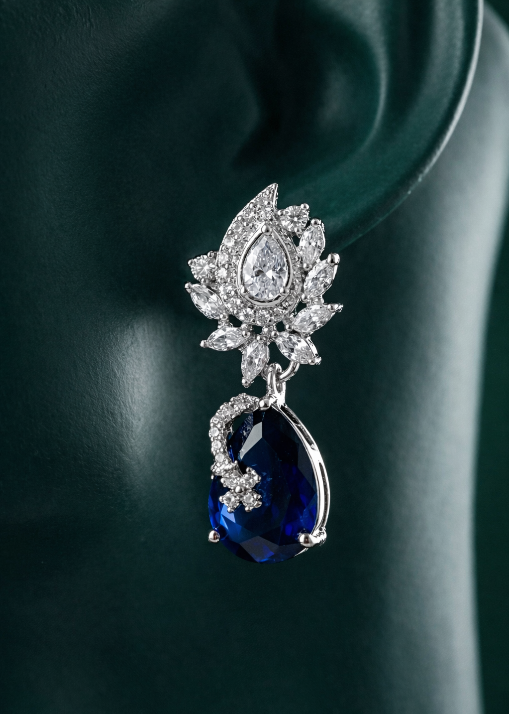 Zelra Rhodium Plated AD Sapphire Blue Teardrop Earrings