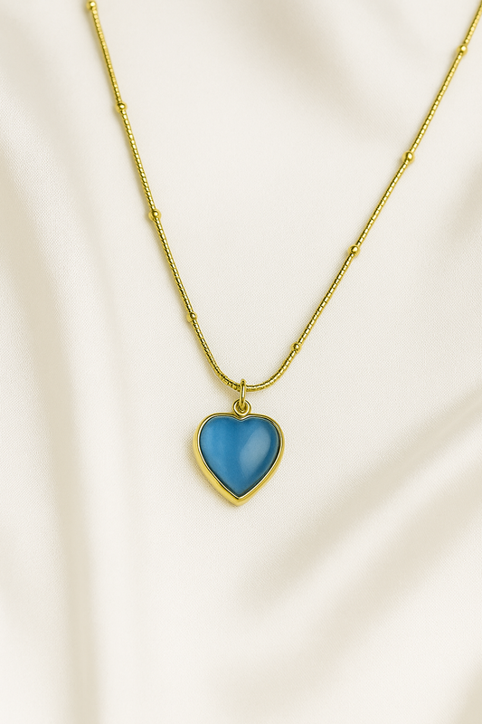 Zelra Blue Heart Pendant Necklace in Gold Finish (Imitation Jewelry)