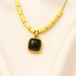Zelra Bold Black Square Pendant Necklace in Gold Finish (Imitation Jewelry)