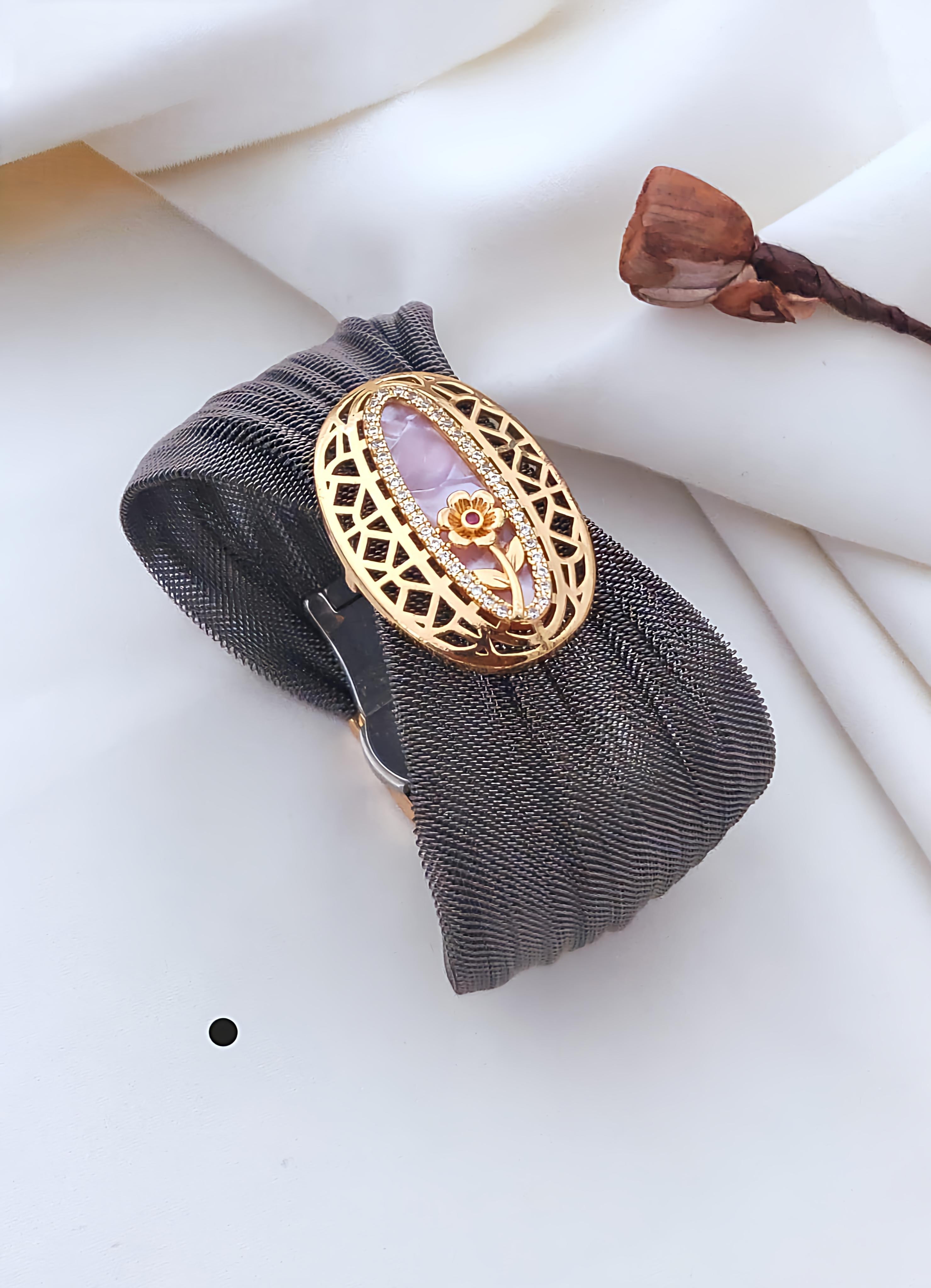 Elegant Gold-Plated Mesh Bracelet with Floral Stone Design