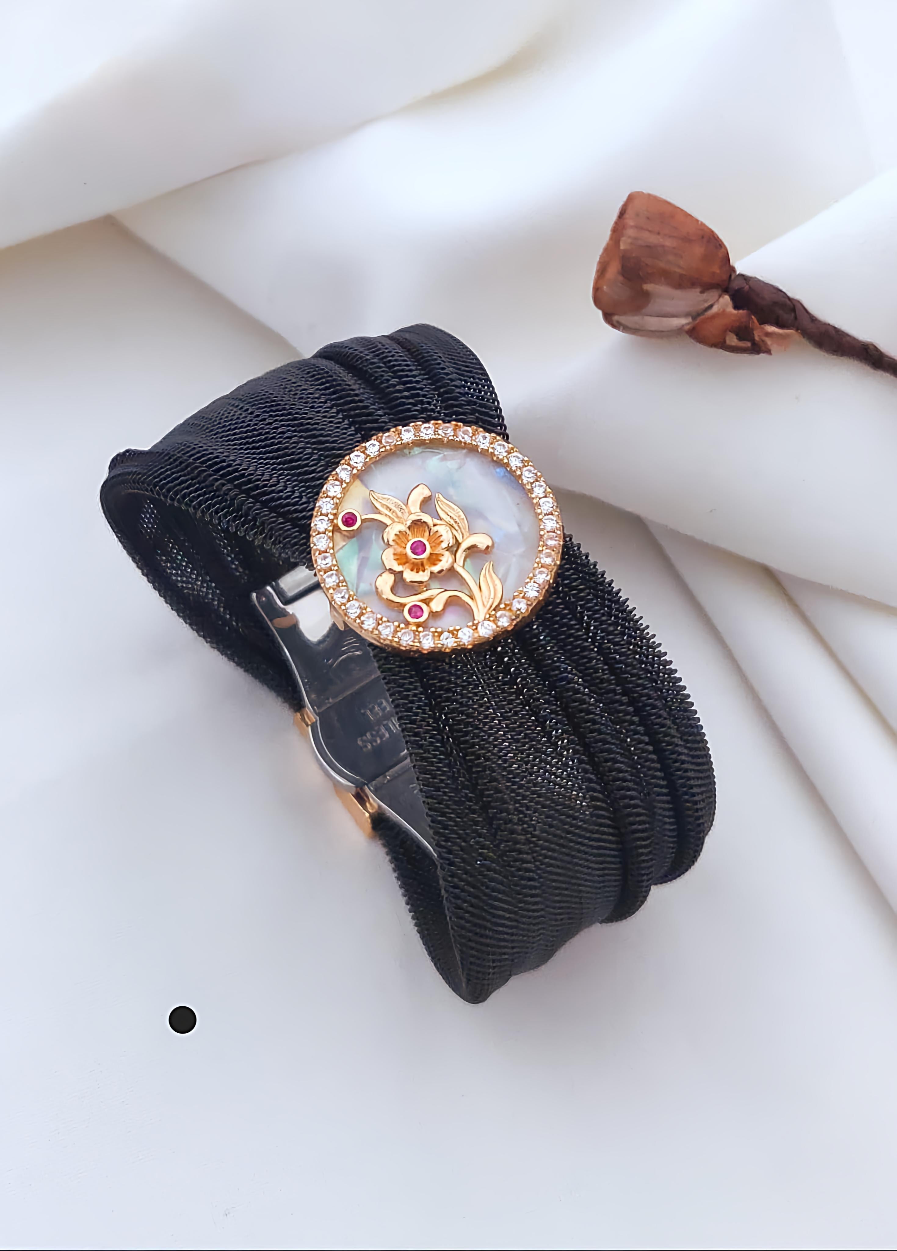 Elegant Gold-Plated Mesh Bracelet with Floral Stone Design