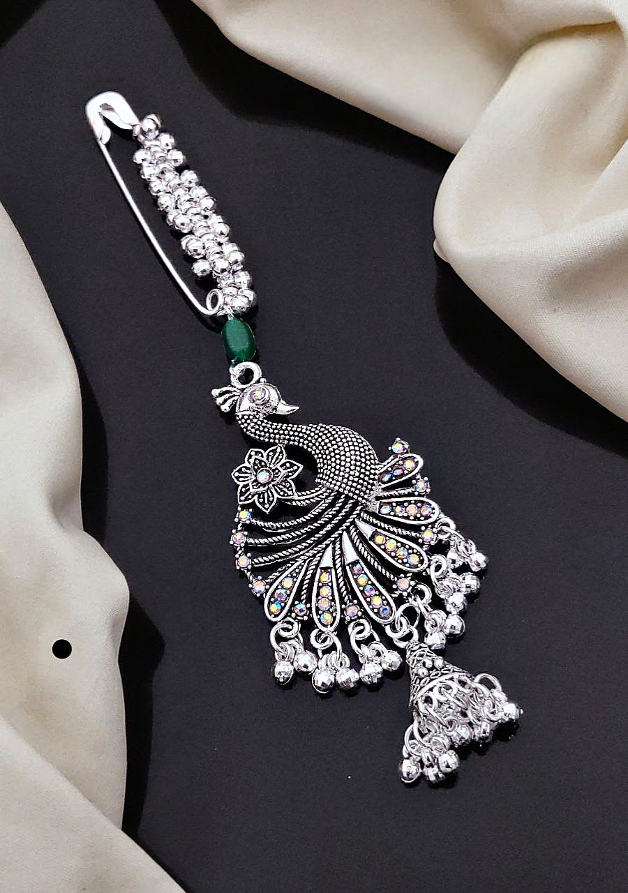 Antique Silver-Plated Peacock Saree Pin with Sparkling Stones & Ghungroo Drops